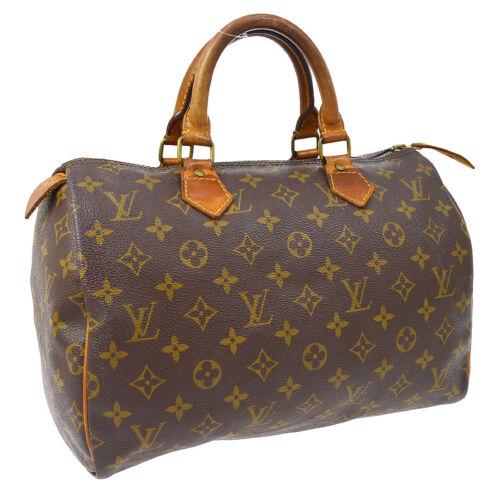Authentic LOUIS VUITTON SPEEDY 30 HAND BAG MONOGRAM: This item qualifies for FREE DOMESTIC SHIPPING to customers in the USA Size: Medium Features: Hand Tooled Inner Pockets Accents: Logo Color: Brown Model: Louis Vuitton Speedy 30 Year Manufactured: 199