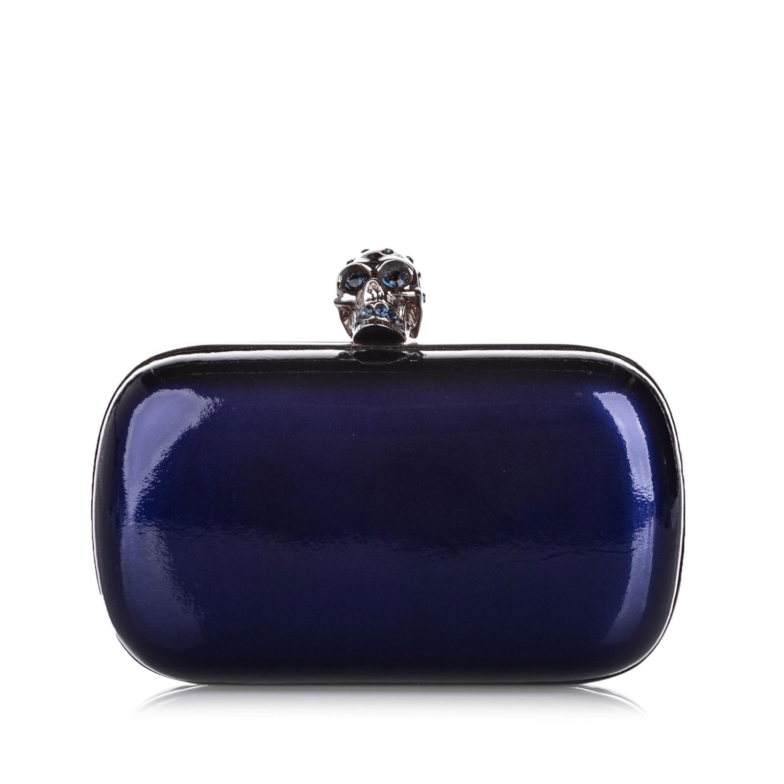 Authentic Alexander McQueen Skull Box Patent Leather: This item qualifies for FREE DOMESTIC SHIPPING to customers in the USA This clutch bag features a patent leather body with silver-tone metal trim a front zipper detail and kiss lock closure with a met