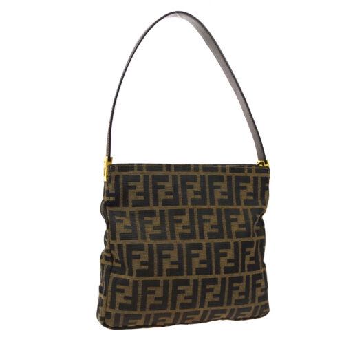 Authentic FENDI Zucca Pattern Shoulder Bag: This item qualifies for FREE DOMESTIC SHIPPING to customers in the USA Size: Medium Pattern: Zucca Model: Shoulder Bag Features: Inner Pockets Accents: Logo Color: Brown Country/Region of Manufacture: