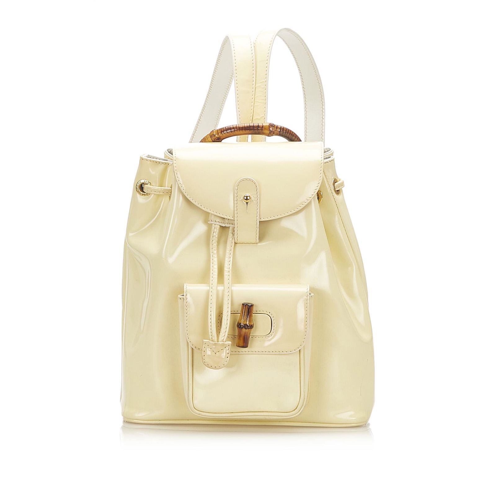 Authentic Gucci Bamboo Patent Leather Drawstring: This item qualifies for FREE DOMESTIC SHIPPING to customers in the USA This backpack features a patent leather body an exterior front flap pocket with bamboo bullet and twist lock closure flat leather