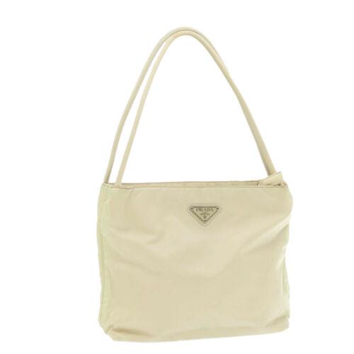 Authentic PRADA Nylon Tote Bag White: This item qualifies for FREE DOMESTIC SHIPPING to customers in the USA Brand: PRADA Size: W23 x H22 x D7cm(Approx) Color: White Country/Region of Manufacture: Italy Material: Nylon Type: unknown Style