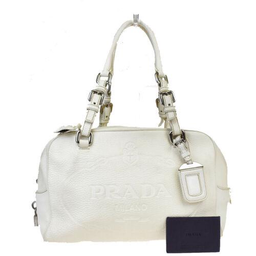 Authentic Prada Undefined Leather Shoulder Bag White: This item qualifies for FREE DOMESTIC SHIPPING to customers in the USA Brand: Prada Closure: Zipper Material: Leather Occasion: Business Style: Shoulder bag Country/Region of Manufacture: Italy Color: