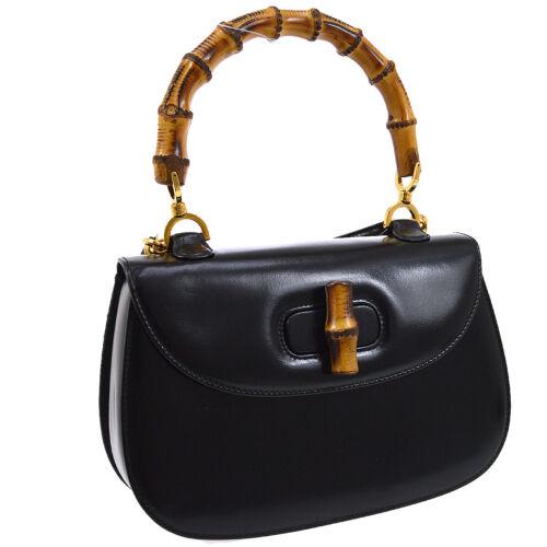 Authentic GUCCI Bamboo Line 2way Hand Bag: This item qualifies for FREE DOMESTIC SHIPPING to customers in the USA Size: Medium Color: Black Accents: Lock Vintage: Yes Model: 2way Hand MPN: Does Not Apply Country/Region of Manufacture: Italy Cl