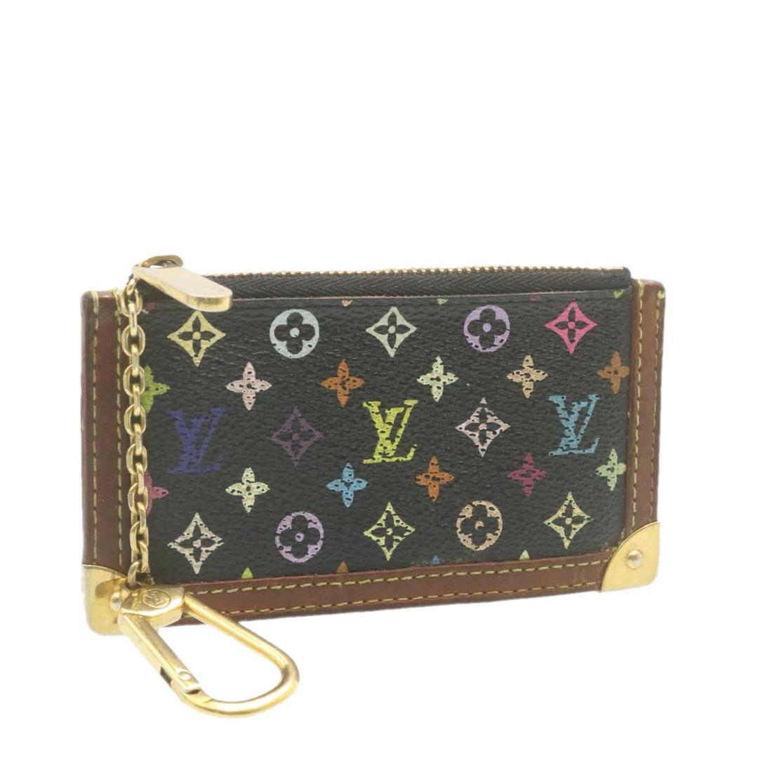 Authentic LOUIS VUITTON Monogram Multicolor Pochette: This item qualifies for FREE DOMESTIC SHIPPING to customers in the USA Brand: LOUIS VUITTON Style: Coin Purse Material: Monogram Multicolor Canvas Color: Black Made In: Spain Size (Inches): W4.9 x H2.