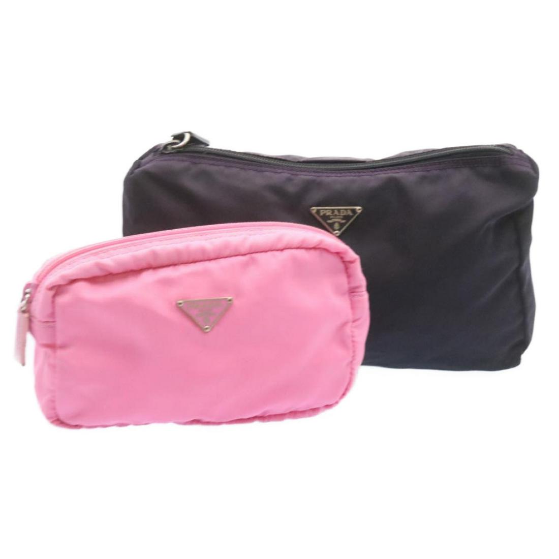 Authentic PRADA Nylon Pouch Purple Pink 2Set: This item qualifies for FREE DOMESTIC SHIPPING to customers in the USA Brand: PRADA Style: Pouch Material: Nylon Color: Pink / Purple Made In: Italy Size (Inches): W6.29 x H3.93 x D1.57inch(Approx W9.
