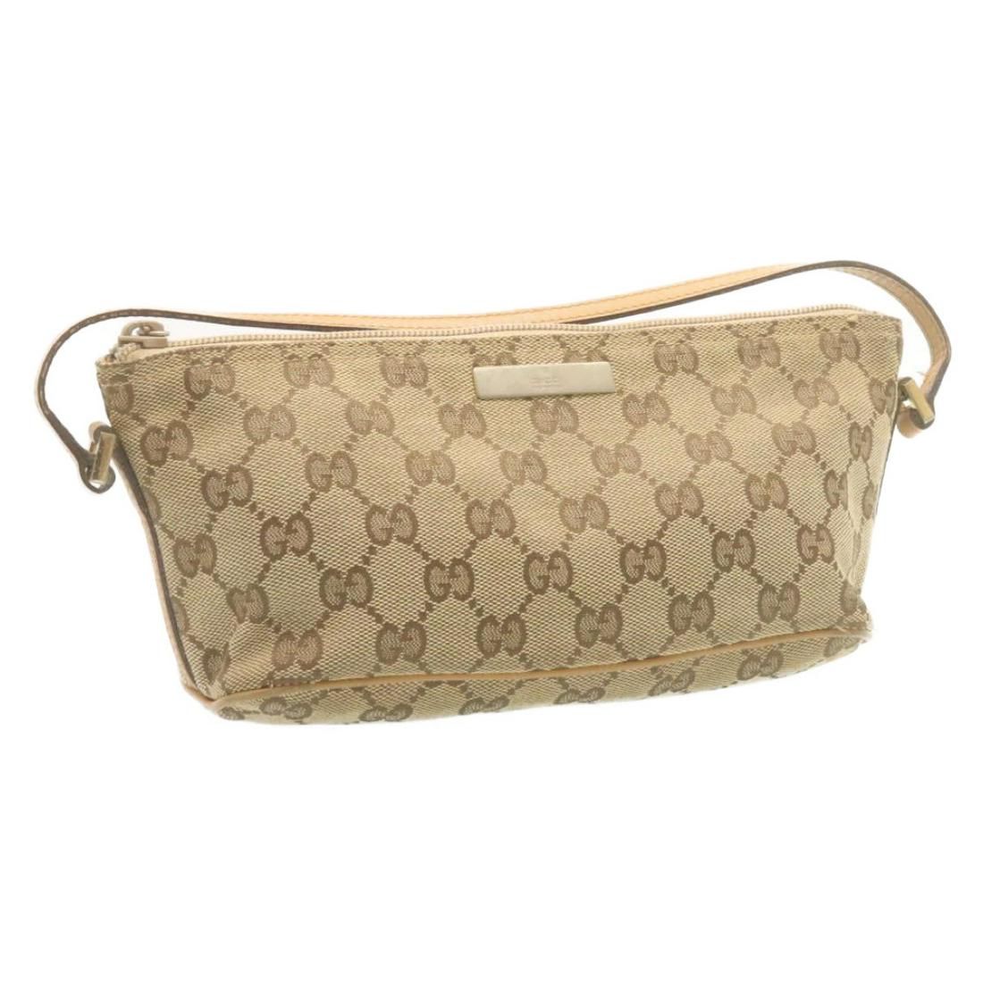 Authentic GUCCI GG Canvas Hand Pouch Beige: This item qualifies for FREE DOMESTIC SHIPPING to customers in the USA Brand: GUCCI Style: Pouch Material: Canvas Color: Beige Made In: Italy Size (Inches): W10.23 x H3.93 x D3.54inch(Approx) Exterior