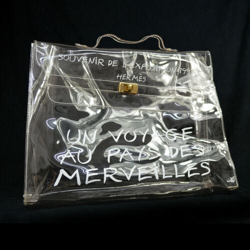Authentic HERMES Vinyl Kelly Hand Beach Bag SOUVENIR DE: This item qualifies for FREE DOMESTIC SHIPPING to customers in the USA Size: Medium Bag Height: 11.4 Style: Hand Bag Color: Clear Material: Vinyl Strap Drop: 1.6 Bag Depth: 4.5 Closure: Flap Turnlock 