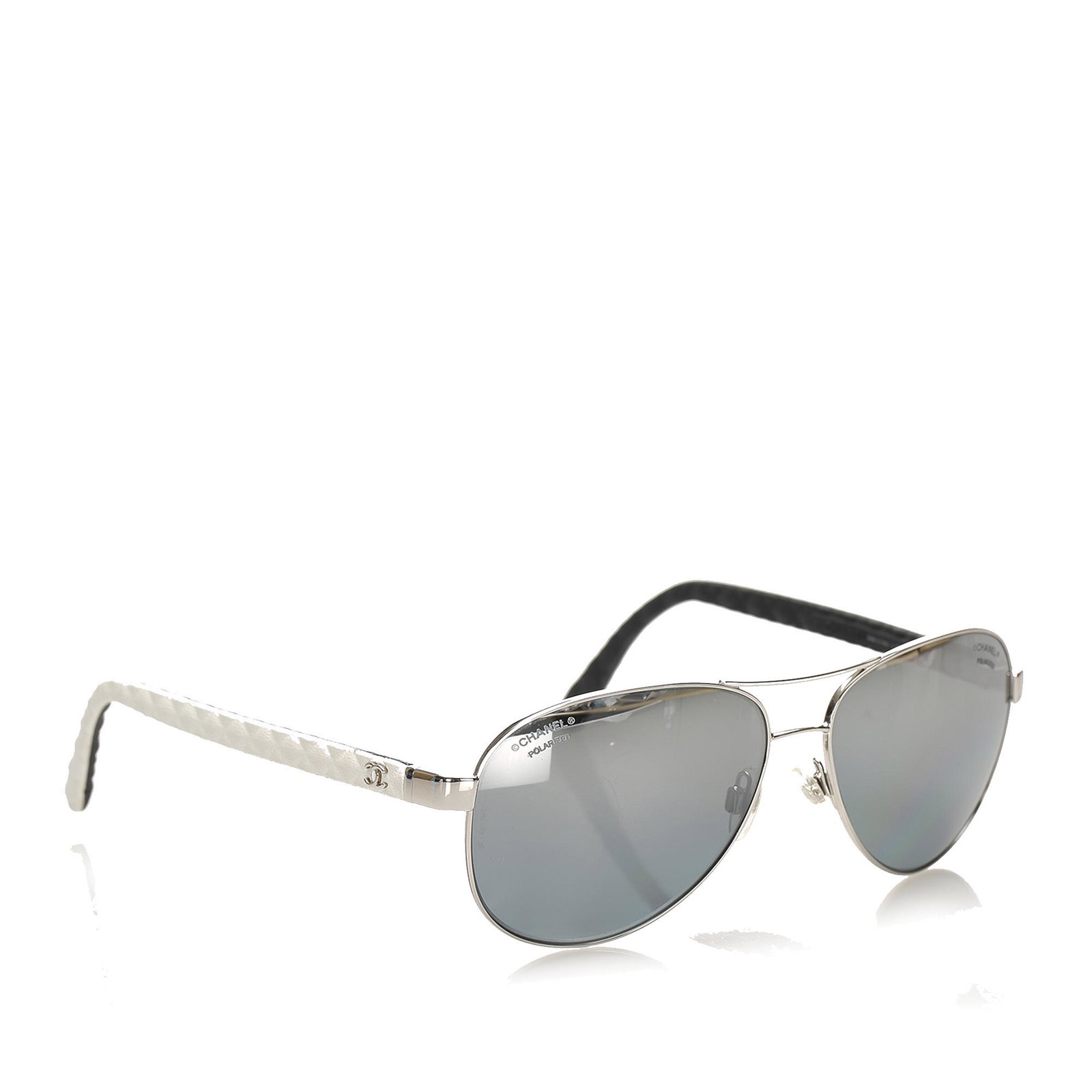 Authentic Chanel Aviator Tinted Sunglasses: This item qualifies for FREE DOMESTIC SHIPPING to customers in the USA These sunglasses feature a metal body with tinted lenses. Brand: Chanel Model: Aviator Tinted Sunglasses Origin: France Category:
