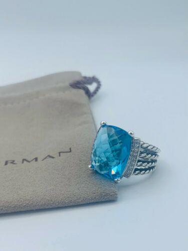 Authentic David Yurman Wheaton Ring with Blue Topaz and: This item qualifies for FREE DOMESTIC SHIPPING to customers in the USA Main Stone: Topaz Main Stone Color: Blue Metal: Sterling Silver Gender: Female Brand: David Yurman Lot: No Ring Size: 9 Metal Pur
