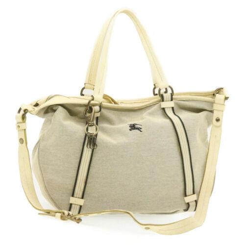 Authentic BURBERRY Blue Label 2Way Tote Shoulder Bag: This item qualifies for FREE DOMESTIC SHIPPING to customers in the USA Brand: BURBERRY Style: Shoulder Bag Color: Beige Size: W42 x H30 x D16cm / Shoulder Drop 42-50cm(Approx) Material: Canvas UPC: Do