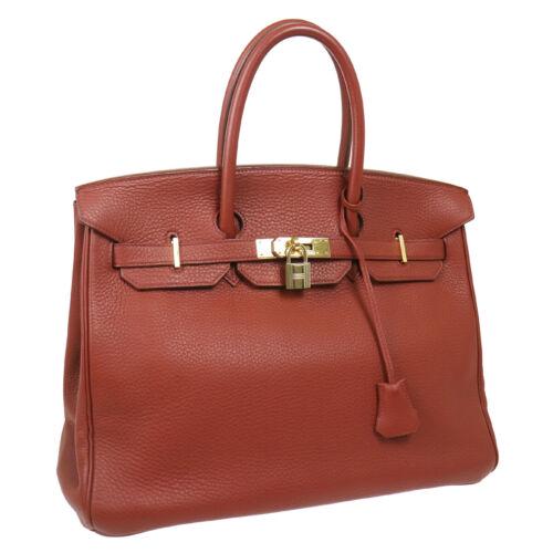 Authentic HERMES BIRKIN 35 Hand Bag: This item qualifies for FREE DOMESTIC SHIPPING to customers in the USA Size: Medium Features: Hand Tooled Bottom Studs Inner Pockets Accents: Lock Color: Bordeaux Model: Birkin 35 MPN: 20C â–¡D Co
