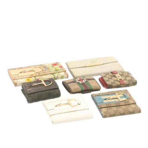 Authentic GUCCI Web Sherry Line GG Canvas Long Wallet: This item qualifies for FREE DOMESTIC SHIPPING to customers in the USA Brand: GUCCI Material: Canvas / Leather Type: unknown Country/Region of Manufacture: Italy Color: Beige / Black / White Departmen