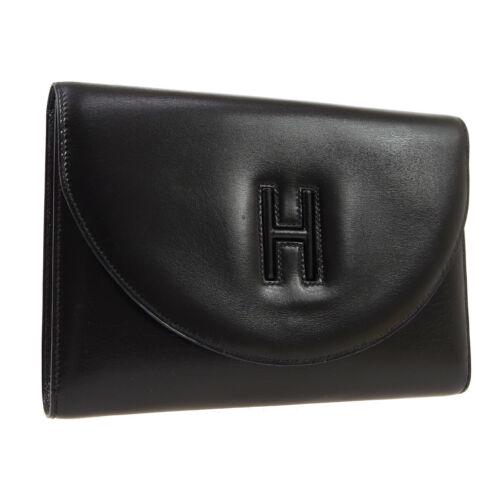 Authentic HERMES H Logo Clutch Hand Bag: This item qualifies for FREE DOMESTIC SHIPPING to customers in the USA Size: Medium Features: Inner Pockets Accents: Logo Color: Black Model: Clutch Bag MPN: â—¯S XN Country/Region of Manufacture: