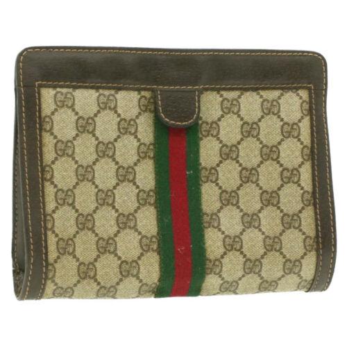 Authentic GUCCI Web Sherry Line GG Canvas Clutch Bag: This item qualifies for FREE DOMESTIC SHIPPING to customers in the USA Brand: GUCCI Style: Clutch Bag Color: Beige Size: W22.5 x H16 x D6cm(Approx) Material: PVC Leather UPC: Does not apply EAN: Does 
