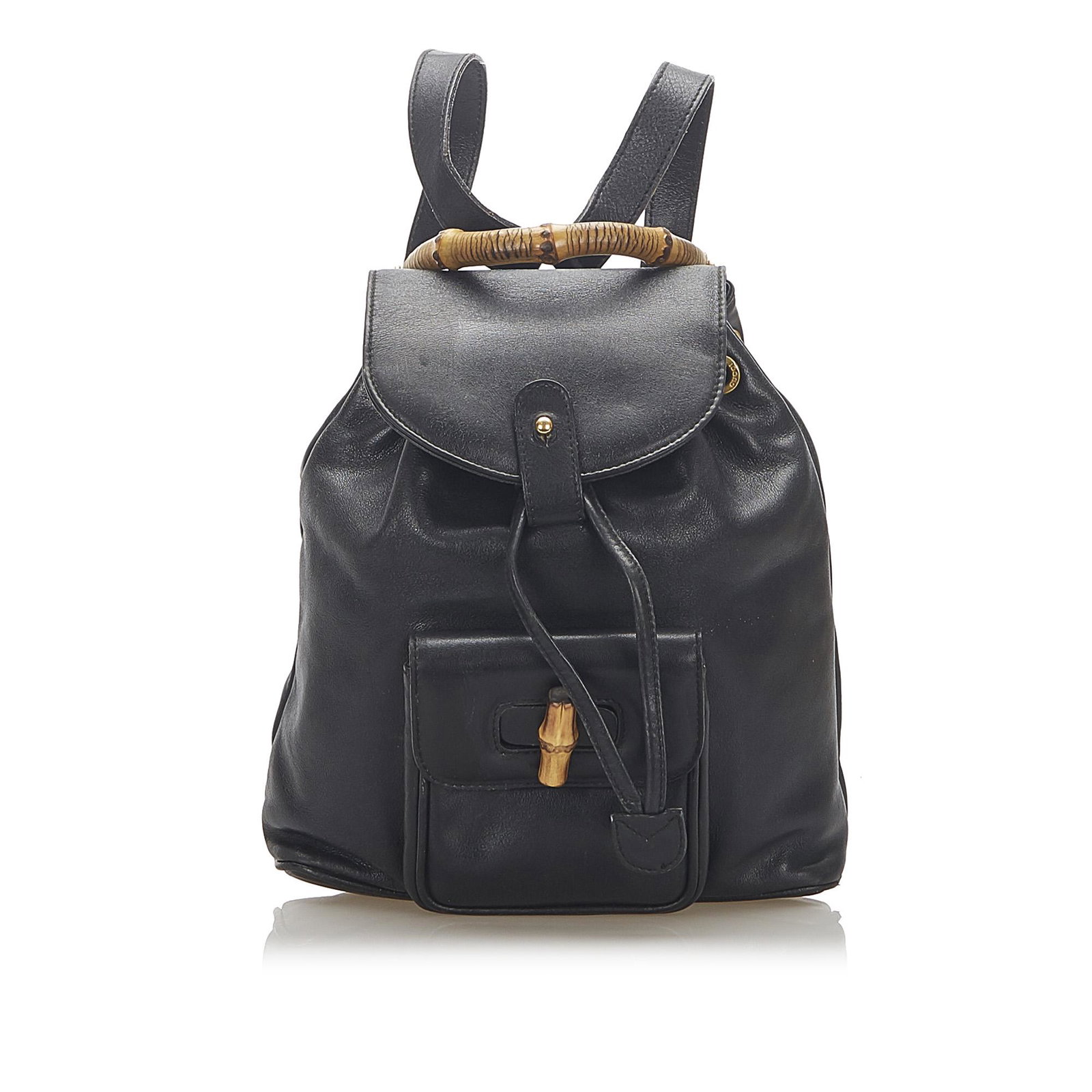Authentic Gucci Bamboo Drawstring Leather Backpack: This item qualifies for FREE DOMESTIC SHIPPING to customers in the USA This backpack features a leather body an exterior front flap pocket with bamboo twist lock closure flat back straps a bamboo top 