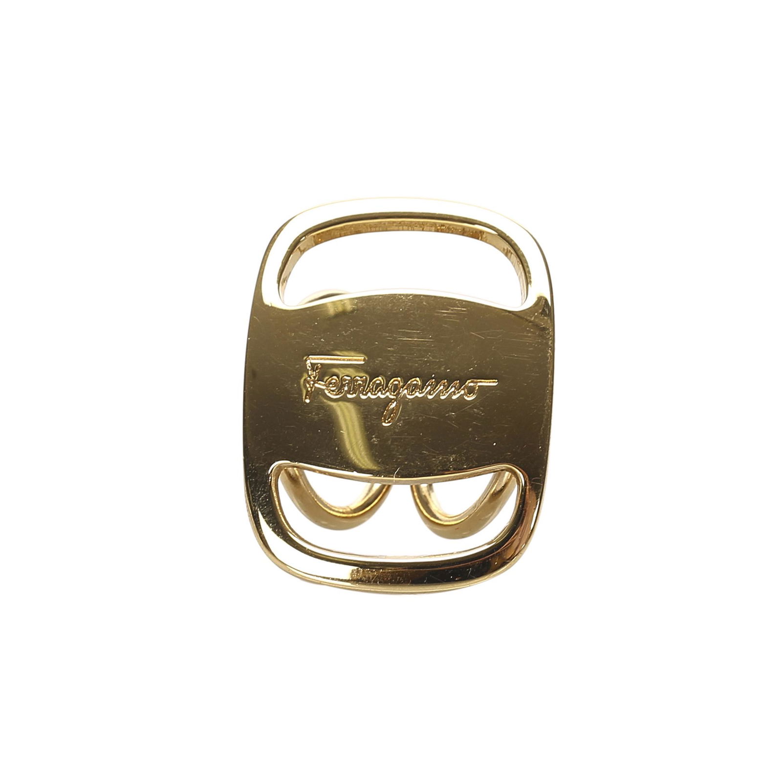 Authentic Ferragamo Vara Scarf Ring: This item qualifies for FREE DOMESTIC SHIPPING to customers in the USA This scarf ring features a gold-tone brass body. Brand: Ferragamo Model: Vara Scarf Ring Origin: Italy Category: Accessories Colo