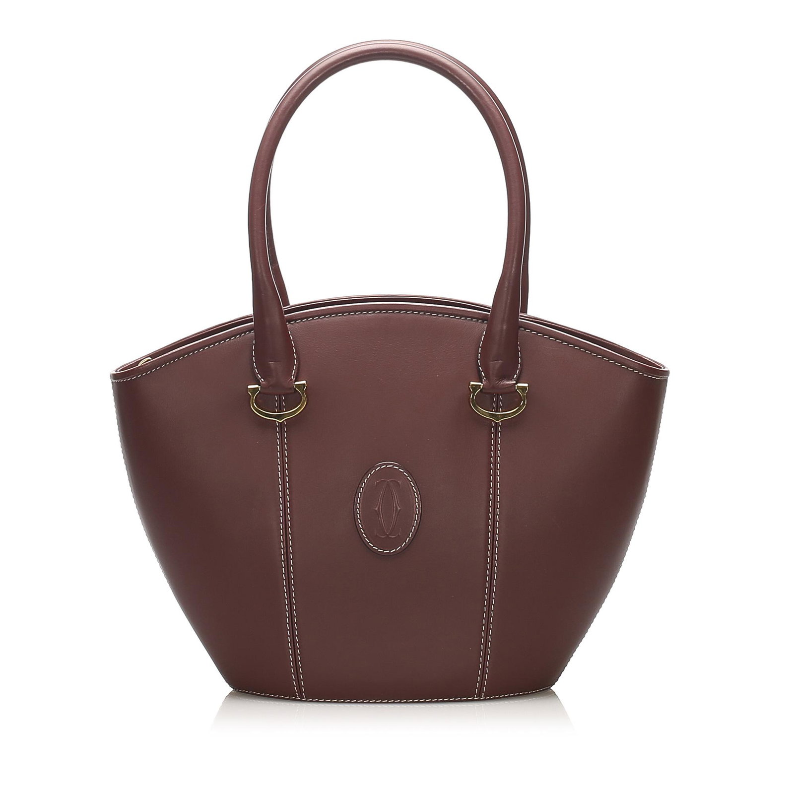 Authentic Must de Cartier Leather Handbag: This item qualifies for FREE DOMESTIC SHIPPING to customers in the USA This handbag features a leather body rolled leather handles a top zip closure and interior zip and slip pockets. Brand: Cartier M