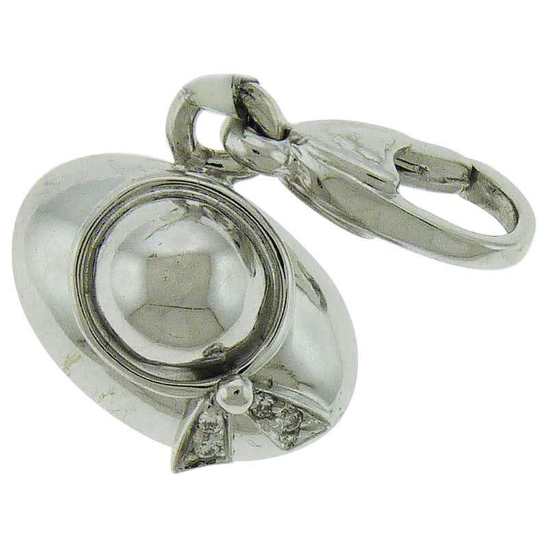 Authentic Diamonds and 18 Karat Gold Charms by Crivelli: This item qualifies for FREE DOMESTIC SHIPPING to customers in the USA A variety of modern charms embellished with diamonds and set in 18K gold. Created by Crivelli in Italy. A hat charm with diamonds
