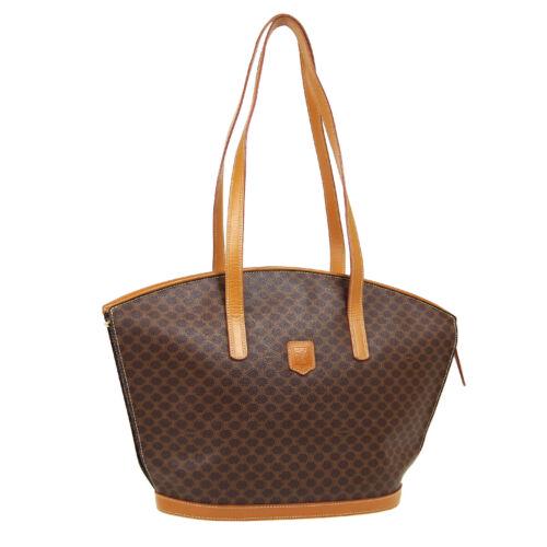 Authentic CELINE Macadam Shoulder Tote Bag: This item qualifies for FREE DOMESTIC SHIPPING to customers in the USA Size: Medium Pattern: Macadam Accents: Logo Features: Inner Pockets Model: Shoulder Tote Color: Brown Country/Region of Manufactu