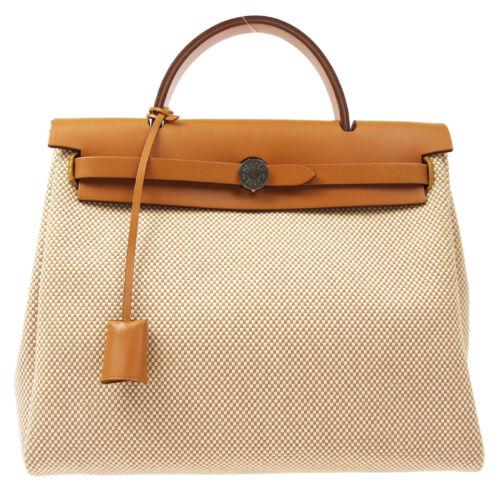 Authentic HERMES HERBAG ZIP 31 2 in 1 Hand Bag: This item qualifies for FREE DOMESTIC SHIPPING to customers in the USA Size: Medium Color: Beige Brown Model: HERMES HERBAG ZIP 31 Year Manufactured: 2010-2019 Country/Region of Manufacture: France MP