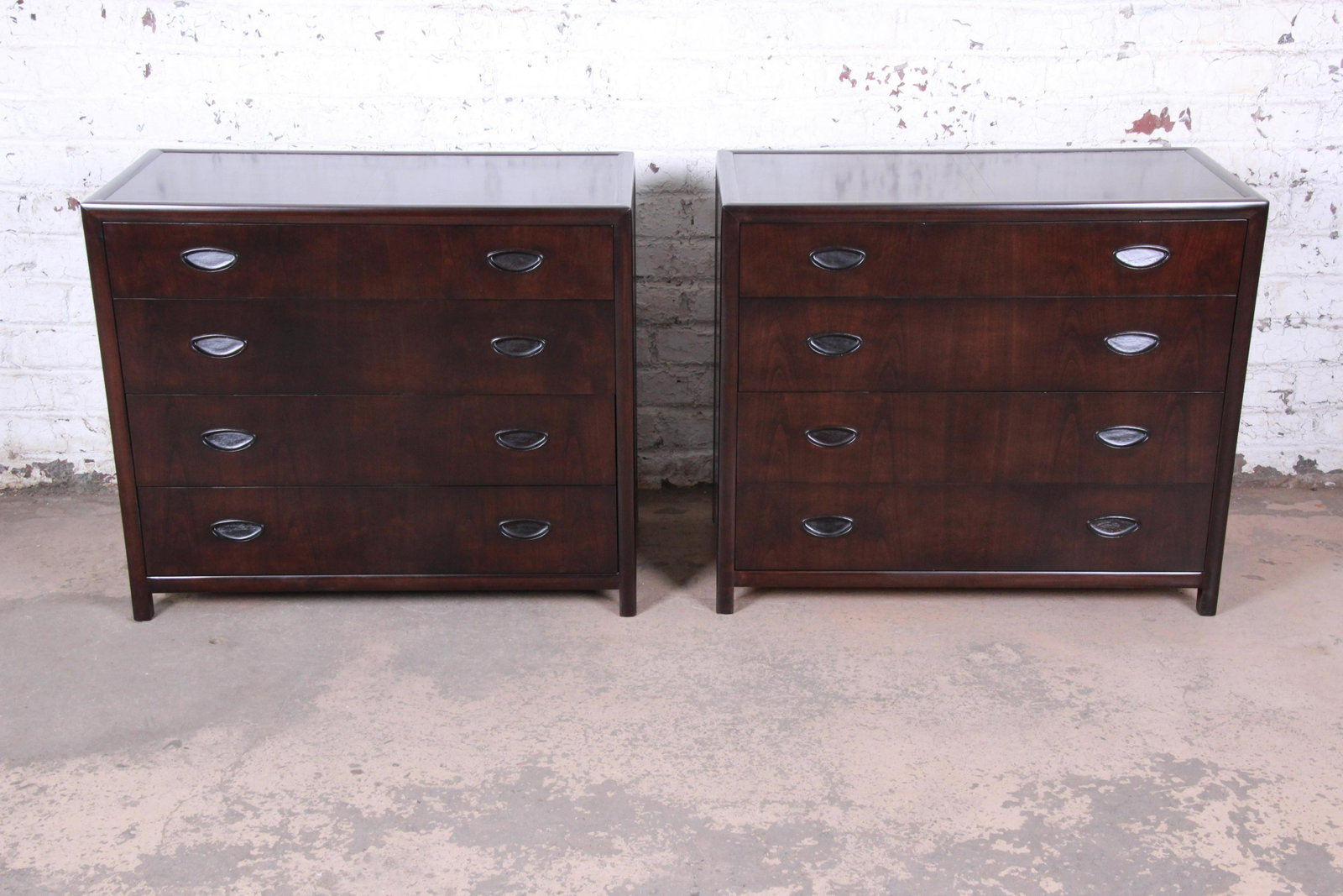 Michael Taylor for Baker Dark Cherry Bachelor Chests or: Please see Disclaimer for shipping cost estimates. An exceptional pair of bachelor chests or large nightstands designed by Michael Taylor for his "New World" collection for Baker Furniture. The chests