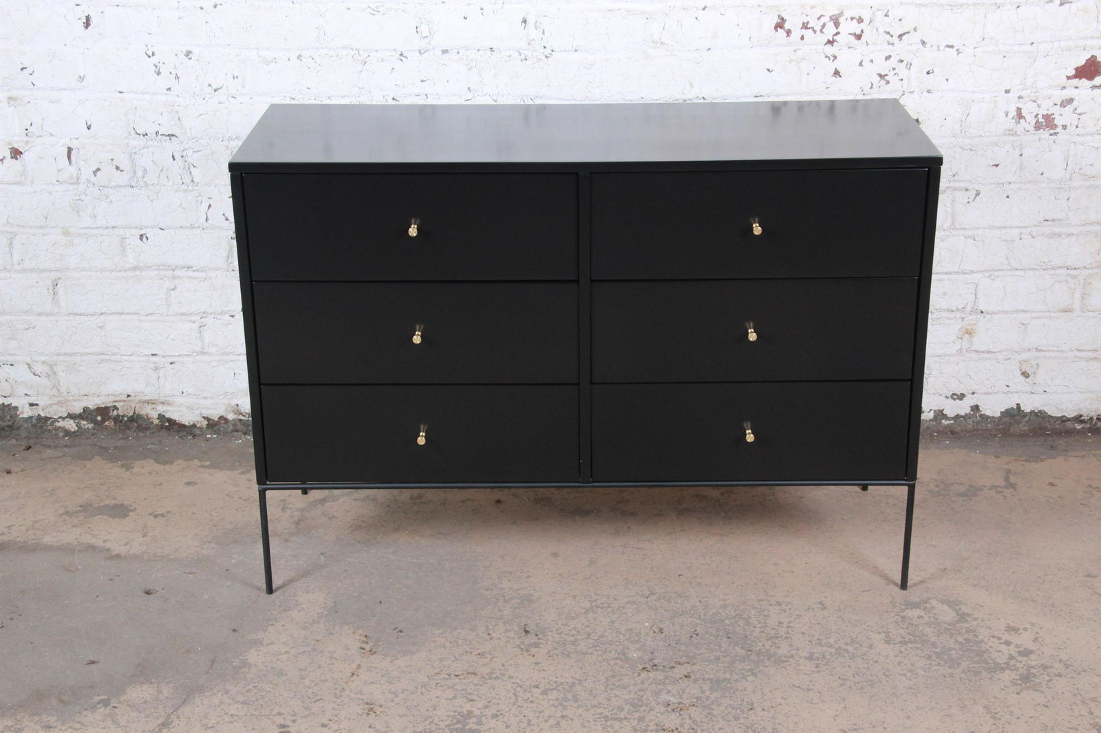Paul McCobb Planner Group Iron Base Black Lacquered: Please see Disclaimer for shipping cost estimates. An exceptional mid-century modern six-drawer iron base dresser or credenza Designed by Paul McCobb for Winchendon Furniture "Planner Group" USA 1950s