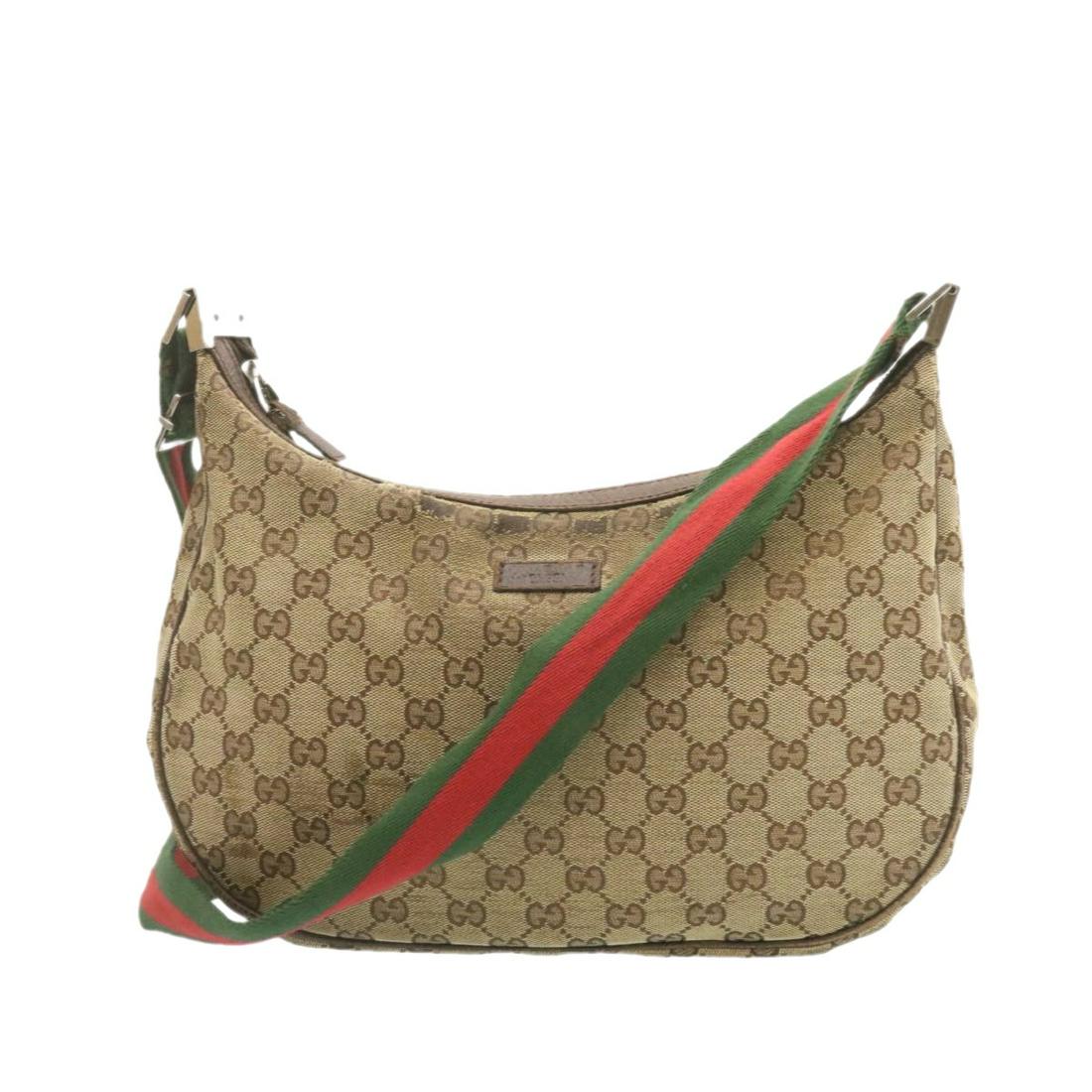 Authentic GUCCI Web Sherry Line GG Canvas Shoulder Bag: This Item qualifies for FREE domestic shipping to customers in the USA Brand: GUCCI Style: Shoulder Bag Material: Canvas Color: Beige Made In: Italy Size (Inches): W12.99 x H11.41 x D1.96inch / Should