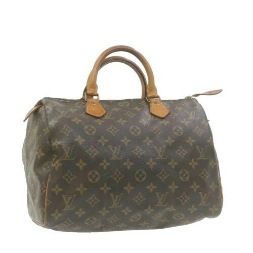 Authentic LOUIS VUITTON Monogram Speedy 30 Hand Bag: This item qualifies for FREE DOMESTIC SHIPPING to customers in the USA Brand: LOUIS VUITTON Size: W30 x H23 x D17cm(Approx) Color: Monogram Country/Region of Manufacture: France Material: Monogram Can