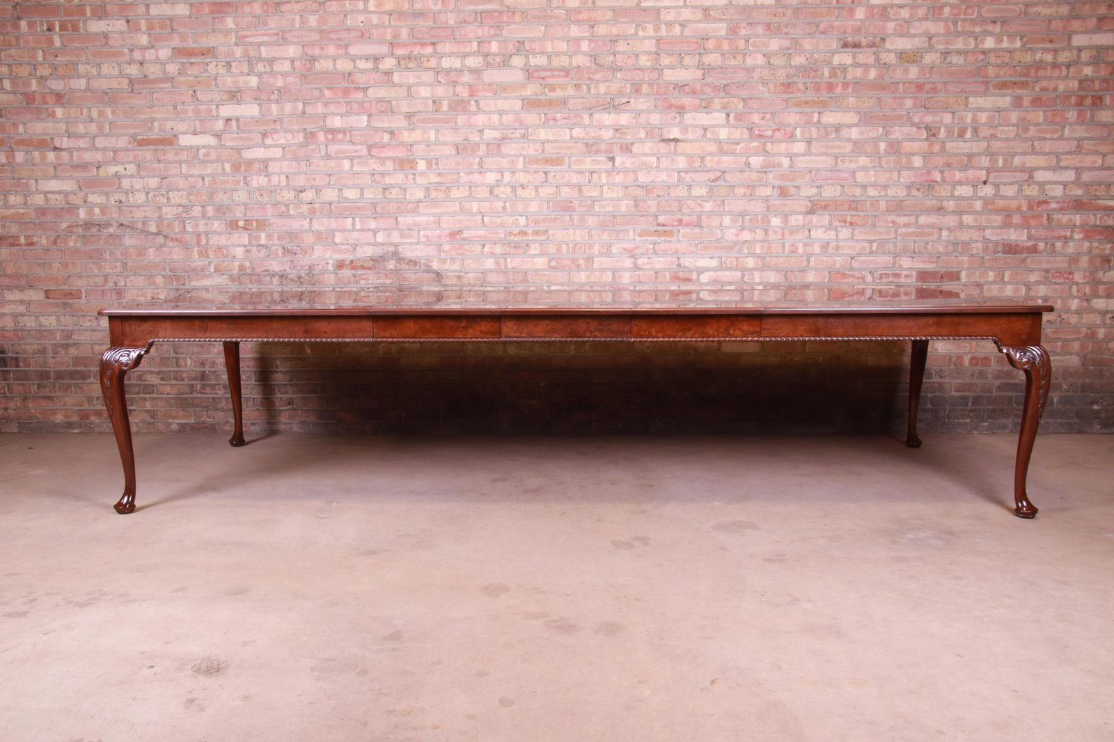 Baker Furniture Stately Homes Queen Anne Inlaid Walnut: Please see Disclaimer for shipping cost estimates. An exceptional Queen Anne extension dining table By Baker Furniture "Stately Homes Collection" USA Late 20th Century Book-matched walnut having a rou