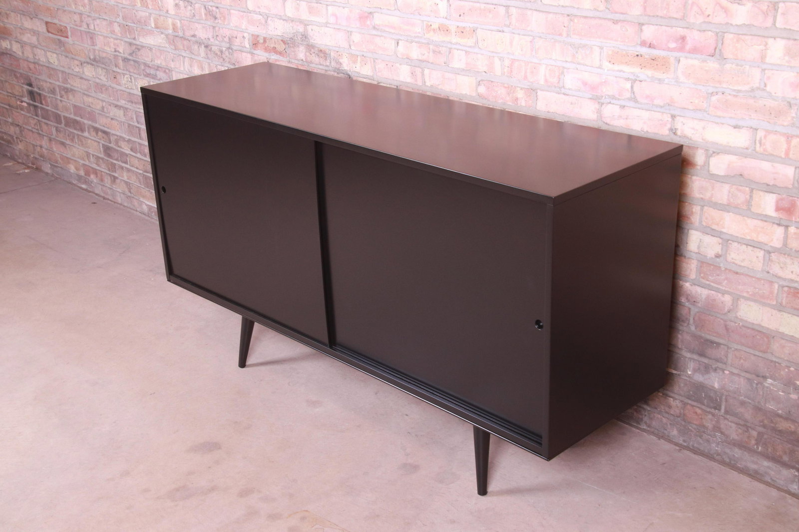 Paul McCobb Planner Group Mid-Century Modern Black: Please see Disclaimer for shipping cost estimates. An exceptional minimalist mid-century modern sliding door sideboard credenza or bar cabinet By Paul McCobb for Winchendon Furniture "Planner Group" U