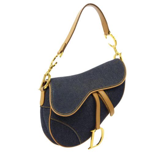 Authentic Christian Dior Saddle Hand Bag: This item qualifies for FREE DOMESTIC SHIPPING to customers in the USA Size: Medium Material: Denim Leather Accents: Logo Pattern: Denim Model: Saddle Hand Bag Features: Bag Charm Pockets Country/Regi