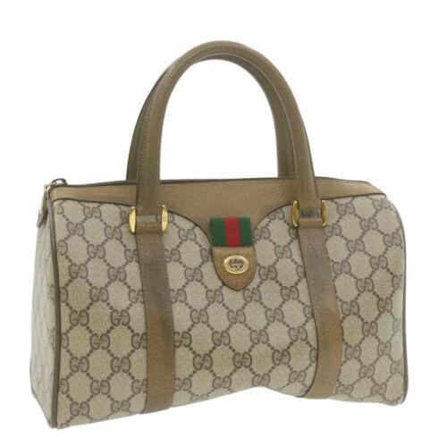 Authentic GUCCI Web Sherry Line GG Canvas Boston Hand: This item qualifies for FREE DOMESTIC SHIPPING to customers in the USA Brand: GUCCI Size: W27 x H17 x D13cm(Approx) Color: Beige Country/Region of Manufacture: Italy Material: PVC Leather Type: unknow