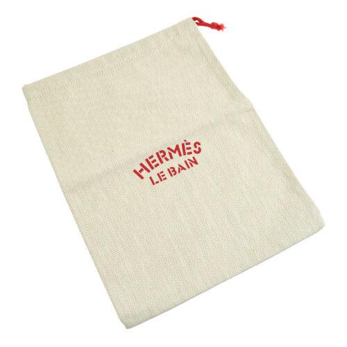 Authentic HERMES Le Bain Yachting Chevrons Drawstring: This item qualifies for FREE DOMESTIC SHIPPING to customers in the USA Size: Small Material: Toile chevrons Accents: Logo Color: Ivory Red Model: HERMES Pouch MPN: Does Not Apply Country/Region of Man
