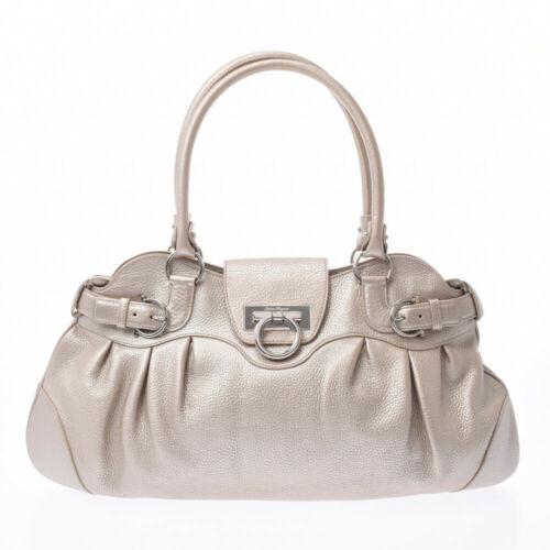 Authentic Salvatore Ferragamo Gancini gold bags: This item qualifies for FREE DOMESTIC SHIPPING to customers in the USA Brand: Salvatore Ferragamo Bag Length: 43cm Style: bags Department: Ladies Size: See Description Type: Tote Bag Bag Height: 28cm