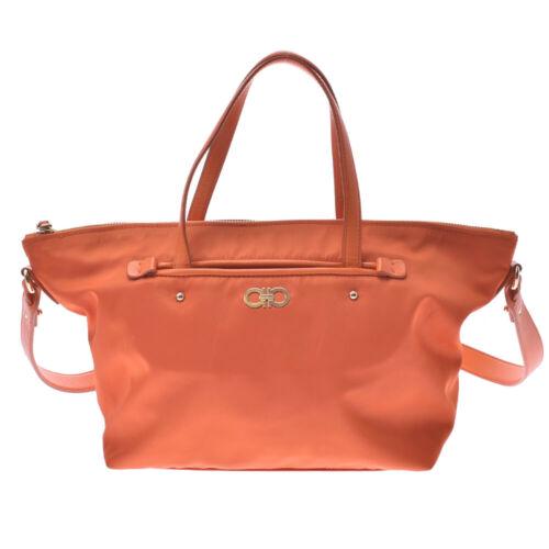 Authentic Salvatore Ferragamo Gancini 2WAY handbag: This item qualifies for FREE DOMESTIC SHIPPING to customers in the USA Brand: Salvatore Ferragamo Bag Depth: 15cm Style: Bag Bag Length: 25-40cm Material: Nylon / leather Department: Ladies Color: Ora