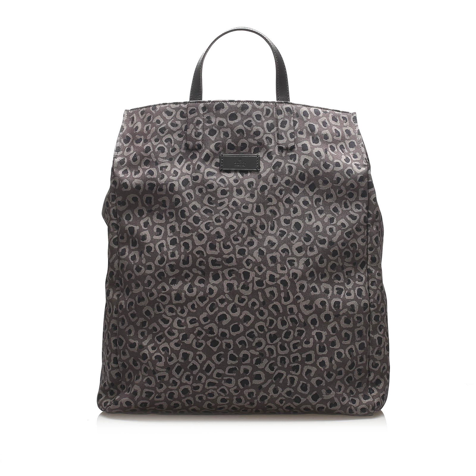 Authentic Gucci Leopard Printed Nylon Tote Bag: This item qualifies for FREE DOMESTIC SHIPPING to customers in the USA This tote bag features a nylon body flat leather handles open top interior slip pockets and an interior zip pocket. Brand: Gucci