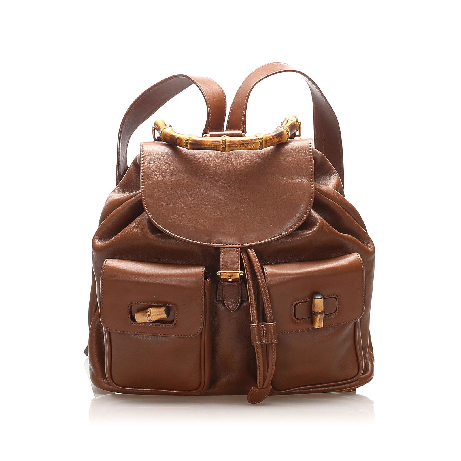 Authentic Gucci Bamboo Drawstring Leather Backpack: This item qualifies for FREE DOMESTIC SHIPPING to customers in the USA This backpack features a leather body flat back straps a bamboo top handle a top flap with buckle closure a drawstring closure fr