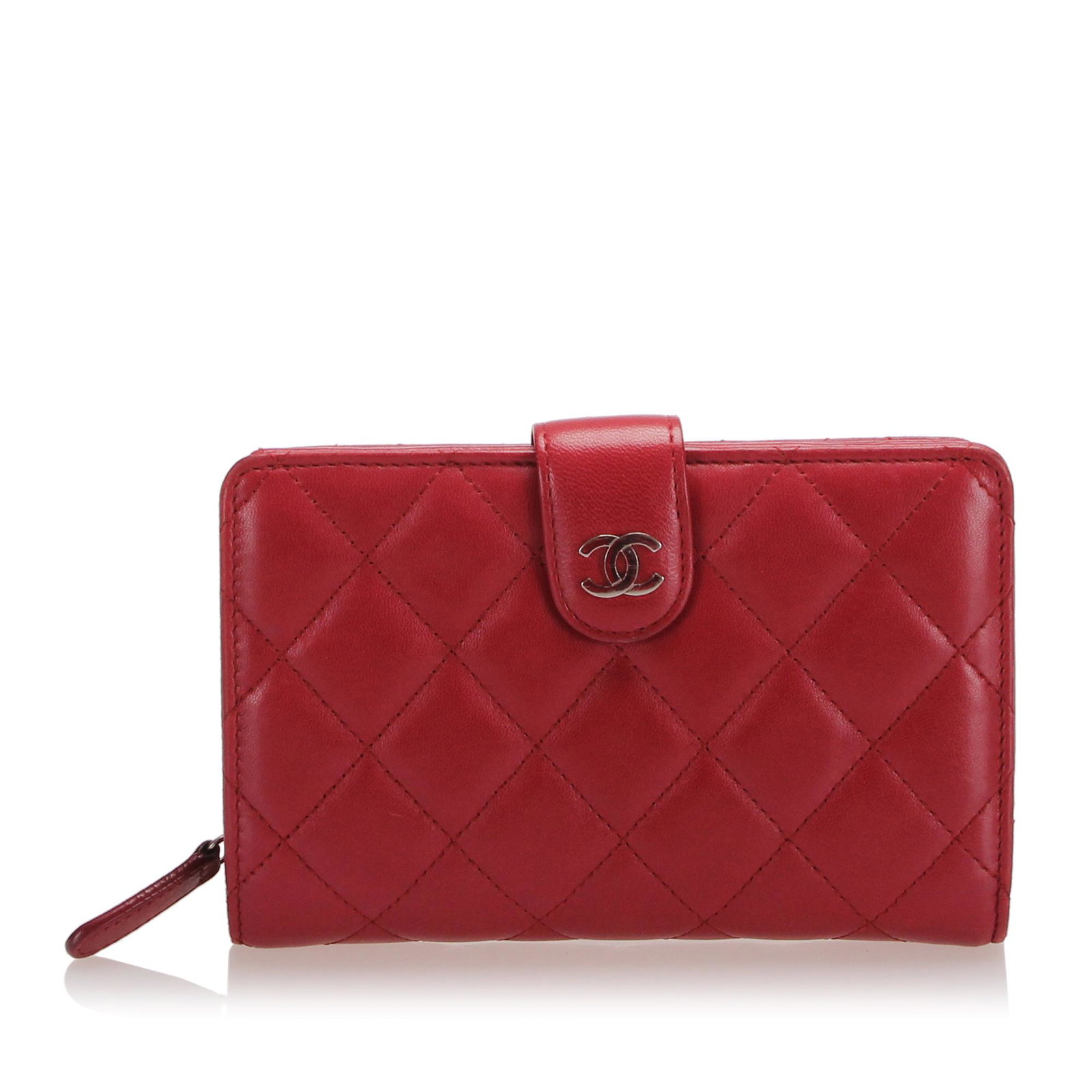 Authentic Chanel Matelasse Lambskin Leather French: This item qualifies for FREE DOMESTIC SHIPPING to customers in the USA This wallet features a quilted lambskin leather body an exterior back slip pocket an exterior zip compartment a top strap with sn