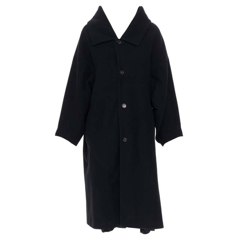 Authentic COMME DES GARCONS black wool blend kimono: This item qualifies for FREE DOMESTIC SHIPPING to customers in the USA COMME DES GARCONS black wool blend kimono sleeve exposed lining winter coat S Brand: Comme Des Garcons Designer: Rei Kawakubo Mod