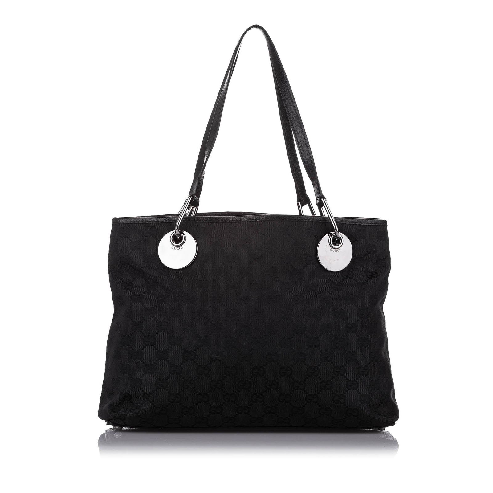 Authentic Gucci GG Canvas Eclipse Shoulder Bag: This item qualifies for FREE DOMESTIC SHIPPING to customers in the USA The Eclipse shoulder bag features a canvas body with leather trim flat leather straps an open top an interior zip compartment and