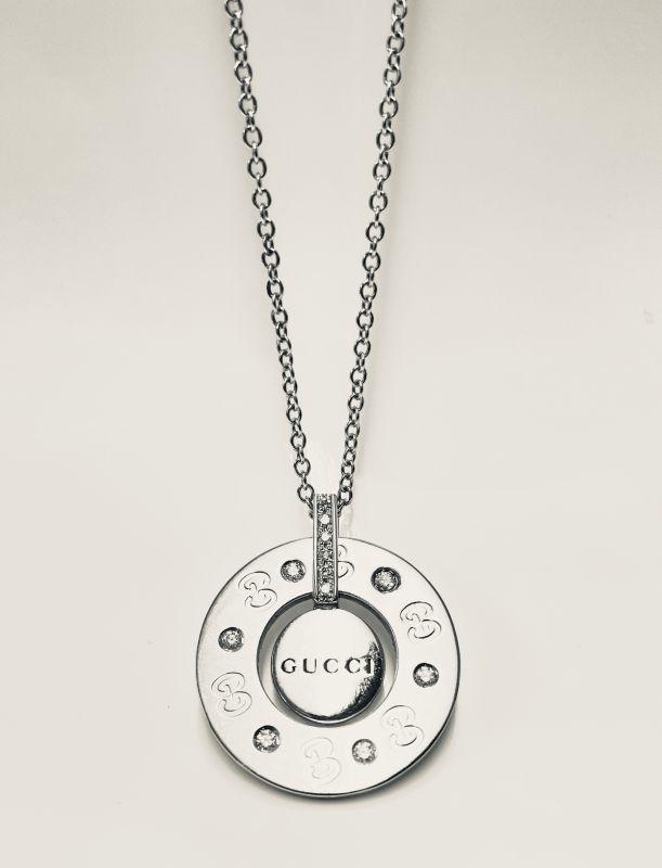 Gucci 18K White Gold Diamond Icon NecklaceLength:: This item qualifies for FREE DOMESTIC SHIPPING to customers in the USA Gucci 18K White Gold Diamond Icon NecklaceLength: 17inches Weight: 0.25ct twd Diamond Weight: Gemstone: 3700 Gemstone Weight: 370