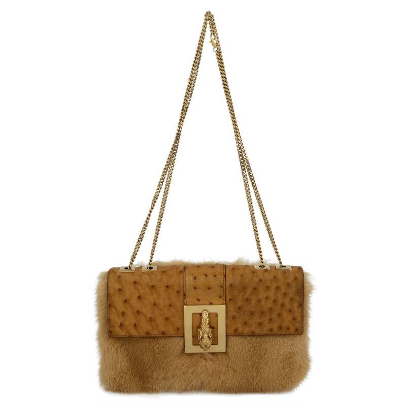 Gucci Panther Gold Tone Fur Leather BagL 9" x D 1" x H: This item qualifies for FREE DOMESTIC SHIPPING to customers in the USA Gucci Panther Gold Tone Fur Leather BagL 9" x D 1" x H 5.5" Weight: Diamond Weight: Gemstone: 3000 Gemstone Weight: 3000 The BIDH