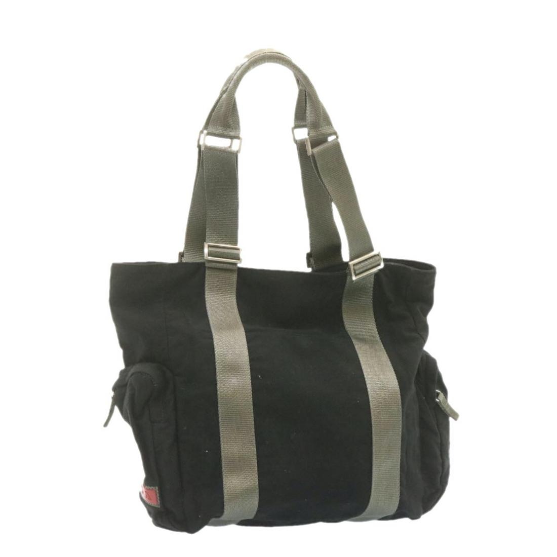 Authentic PRADA Sports Tote Bag Black Canvas: This item qualifies for FREE DOMESTIC SHIPPING to customers in the USA Brand: PRADA Style: Tote Bag Material: Canvas Color: Black Made In: Italy Size (Inches): W7.08 x H8.66 x D3.54inch / Shoulder Dro