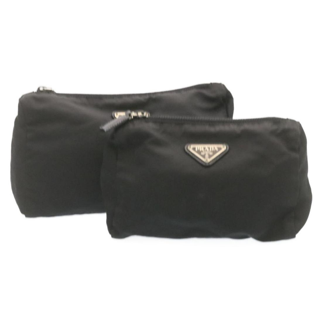 Authentic PRADA Nylon Pouch 2Set Black: This item qualifies for FREE DOMESTIC SHIPPING to customers in the USA Brand: PRADA Style: Pouch Material: Nylon Color: Black Made In: Italy Size (Inches): W9.44 x H5.51 x D3.54inch(Approx) W7.48 x H4
