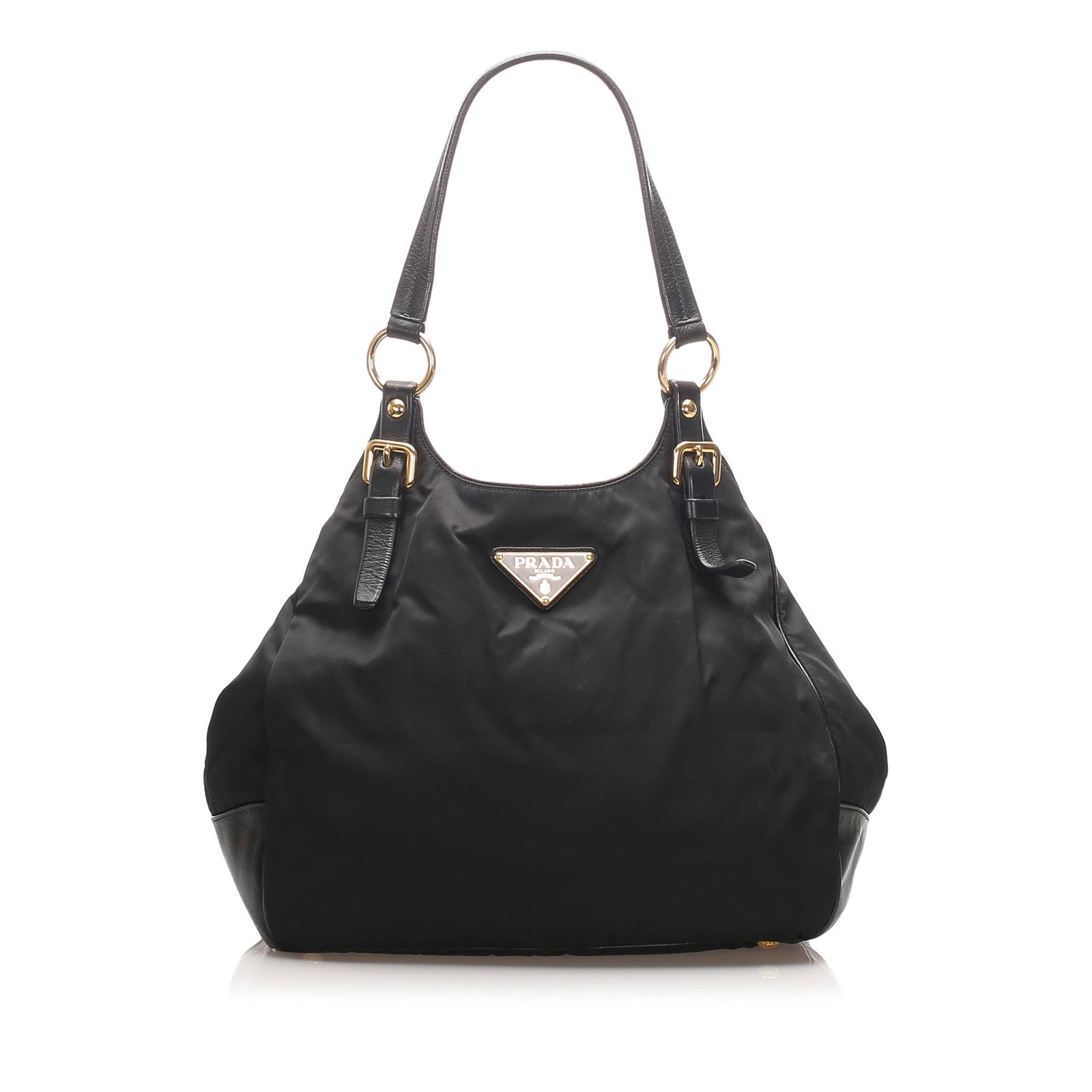 Authentic Prada Tessuto Shoulder Bag: This item qualifies for FREE DOMESTIC SHIPPING to customers in the USA This shoulder bag features a nylon body with leather trim flat leather straps an open top with magnetic snap button closure and a