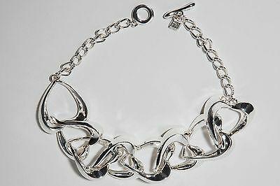 Robert Lee Morris Silver Plated Heart Shaped Necklace: This item qualifies for FREE DOMESTIC SHIPPING to customers in the USA Sweet and sassy statement necklace. Silver plated over base metal. Made in the 1990s. Necklace measures 16" in length. Tag reads