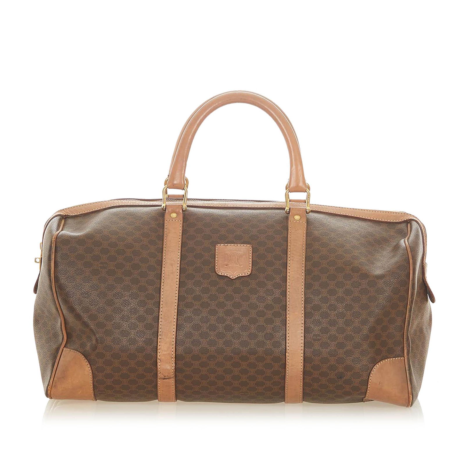 Authentic Celine Macadam Travel Bag: This item qualifies for FREE DOMESTIC SHIPPING to customers in the USA This travel bag features a pvc body with leather trim rolled leather handles a top zip closure and an interior zip pocket. Brand: