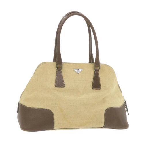 Authentic PRADA Canvas Hand Bag Beige Brown: This item qualifies for FREE DOMESTIC SHIPPING to customers in the USA Brand: PRADA Size: W35 x H20 x D14cm(Approx) Color: Beige Country/Region of Manufacture: Italy Material: Nylon Type: unknown Styl