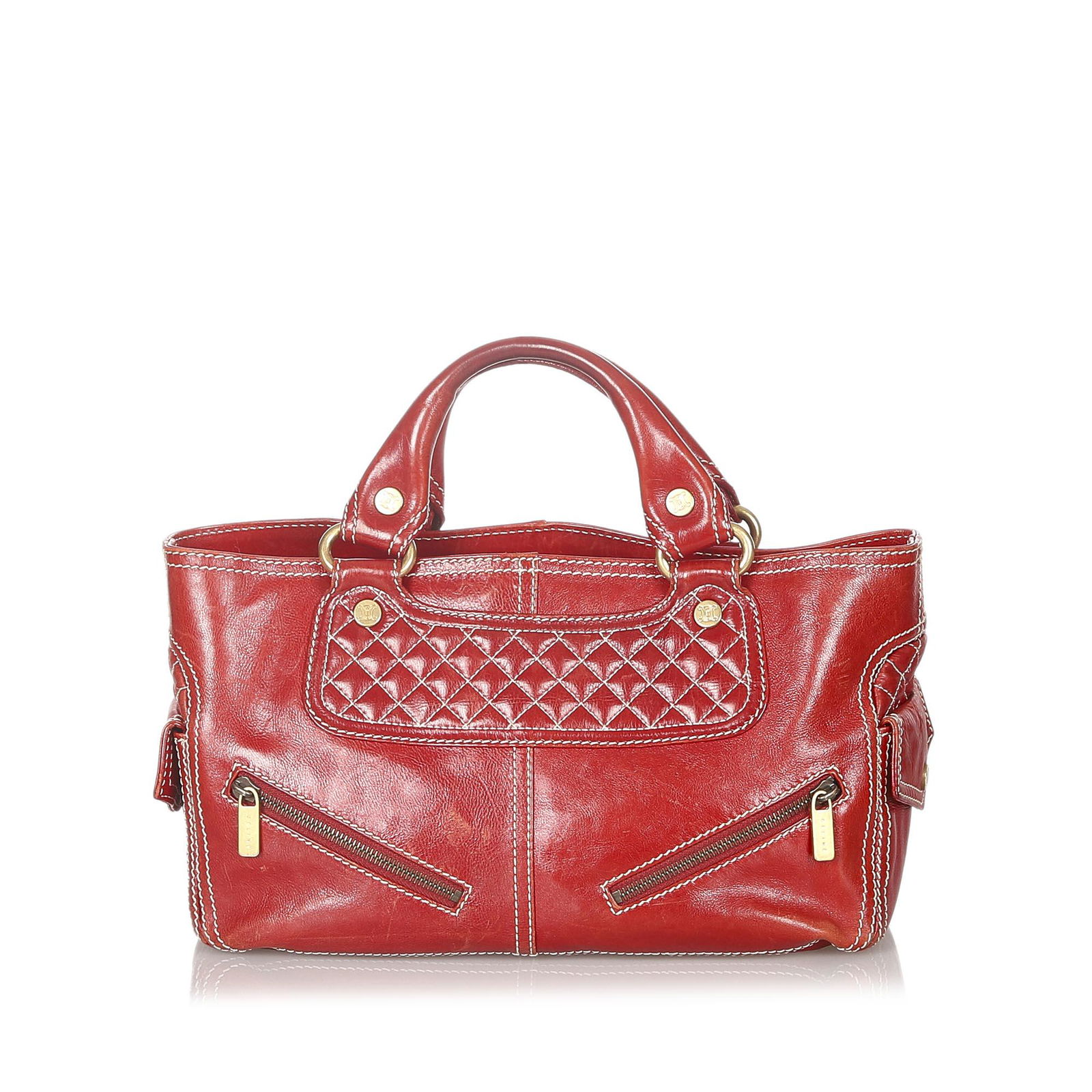 Authentic Celine Boogie Leather Handbag: This item qualifies for FREE DOMESTIC SHIPPING to customers in the USA The Boogie features a leather body exterior zip and flap pockets rolled leather handles an open top an interior zip compartment a