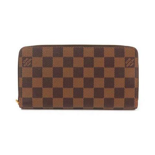 Authentic LOUIS VUITTON Damier Wallet N41661: This item qualifies for FREE DOMESTIC SHIPPING to customers in the USA Brand: Louis Vuitton Style: Purse Type: Purse Material: Coating Canvas Color: Ebene / Gold Parts Size: W X H X Gusset (W):19.5Cm